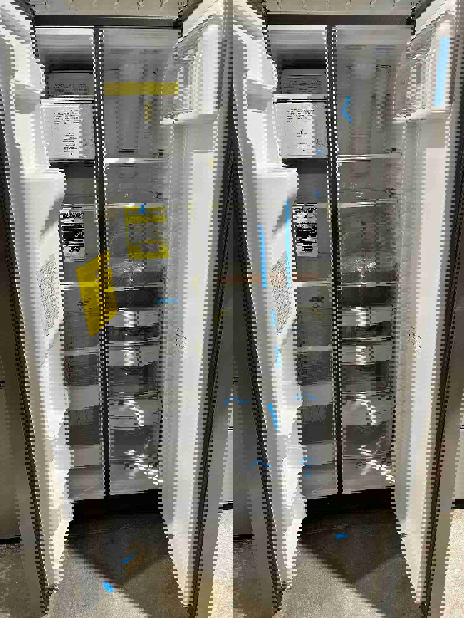 GE - 25.1 Cu. Ft. Side-By-Side Refrigerator with Ice and Water Dispenser - Stainless Steel